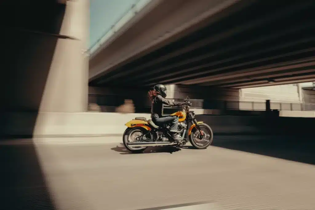 Hair blowing in the wind and enjoying the road aboard the Harley-Davidson Street Bob