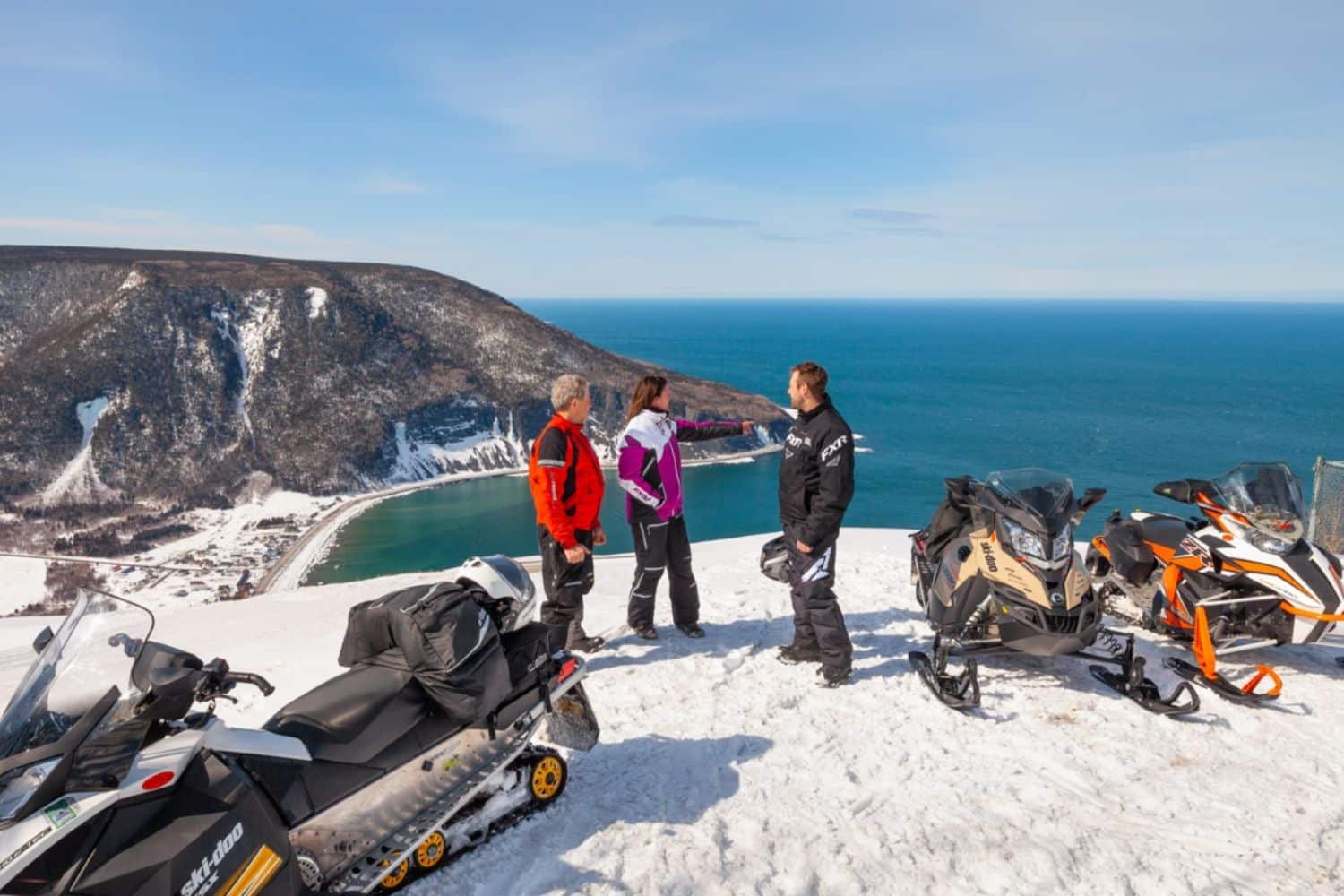 Experience breathtaking coastal views, majestic mountains, and over 3,000 km of pristine snowmobile trails across the Gaspesia Peninsula.