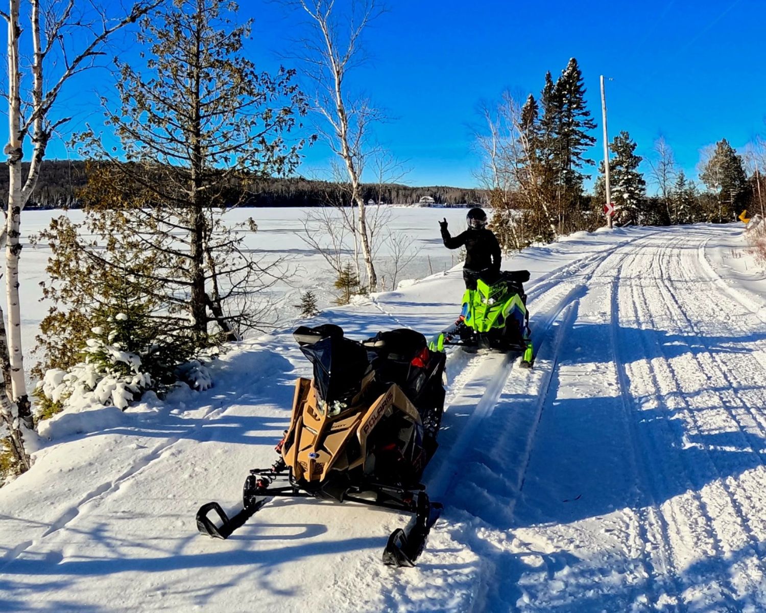You often see couples riding their own snowmobiles.