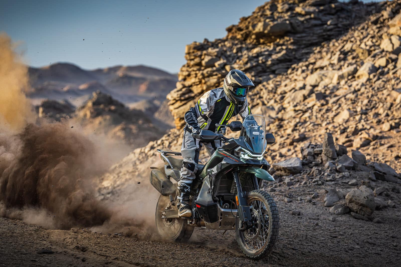 2027 CFMOTO IBEX 950 adventure motorcycle riding off-road